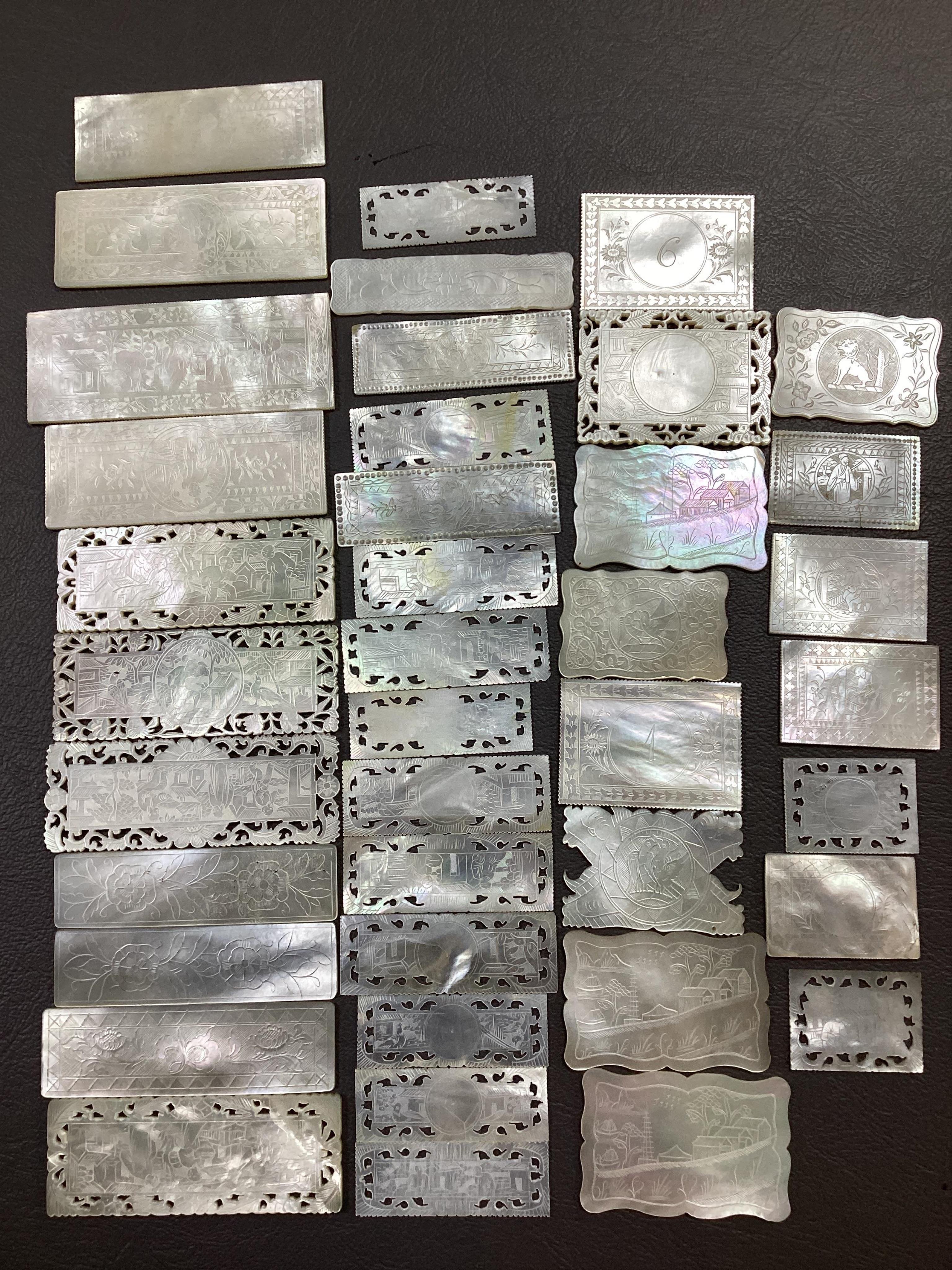 Two Chinese gilt decorated black lacquer games boxes, containing numerous mother-of-pearl counters, 19th century